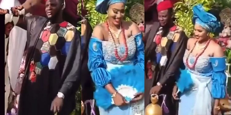 Man seen spraying onions on a couple during traditional wedding (Video)