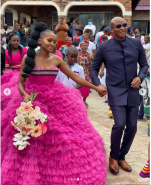 South African bride looks stunning in pink wedding dress
