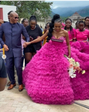 South African bride looks stunning in pink wedding dress