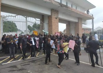 ISOPADEC staff  protest, barricade entrance to office
