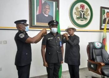 Obiano decorates his ADC, tasks others on professionalism
